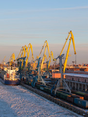 Obraz premium View from the Gulf of Finland covered with ice on St. Petersburg seaport. Russia