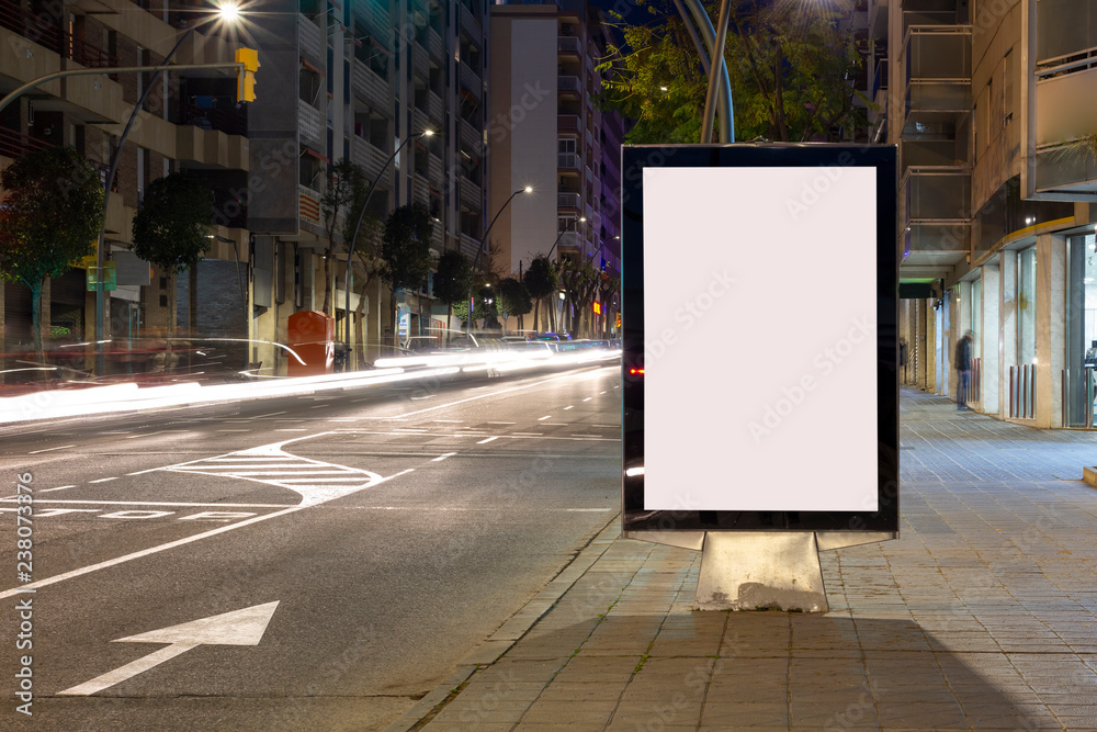 Wall mural Blank advertisement billboard, with blurred traffic lights at night