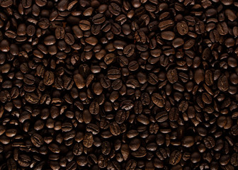 Coffee beans on the table background blurred abstract blurred