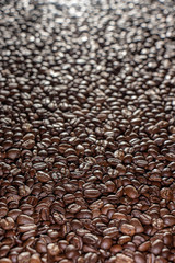 Coffee beans on the table background blurred abstract blurred