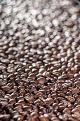 Coffee beans on the table background blurred abstract blurred