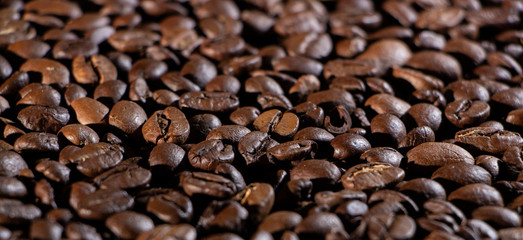 Coffee beans on the table background blurred abstract blurred