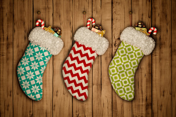Christmas stocking on old wooden background 3D rendering