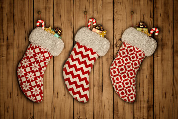 Christmas stocking on old wooden background 3D rendering