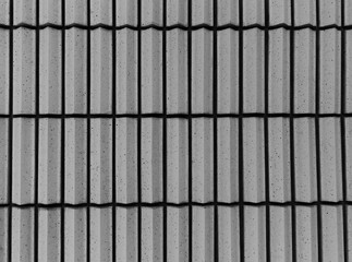 Striped ribbed wall building in grey tones for abstract background or texture