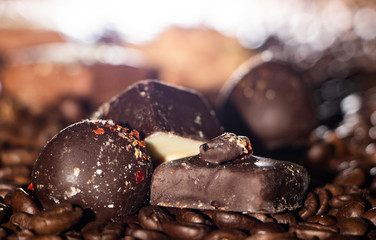 Chocolate pieces and coffee beans close up