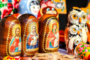 Fototapeta premium Traditional handicraft wooden souvenirs at street gift store near complex 