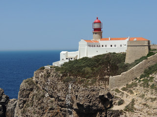 Fototapeta na wymiar lighthouse on the rock: Sagres, Algarve, Portugal