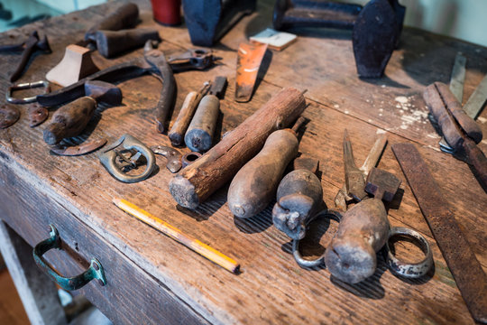 Detail of a shoemaker's wooden counter.