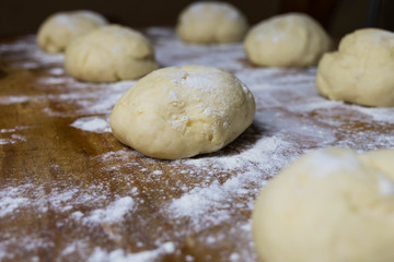 Fototapeta na wymiar dough with rolling pin