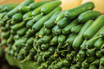 Pile of cucumbers background.