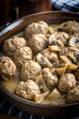 Delicious homemade swedish meatballs with mushroom cream sauce. Small depth of field.