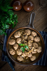 Delicious homemade swedish meatballs with mushroom cream sauce. Small depth of field.