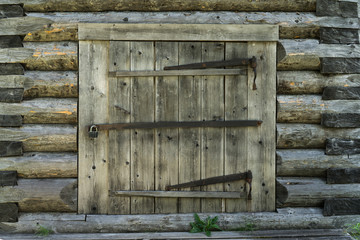 Abandoned barn vintage wooden door. Old photo of rustic house entrance