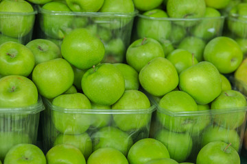 Pile of green apples background.