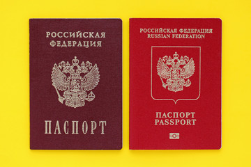 Biometric passports and passport of the citizen of the Russia on yellow background