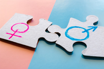 male and female gender symbol close up
