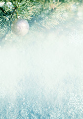 Template of Christmas background with pine branches, Christmas decoration, bokeh and snowflakes