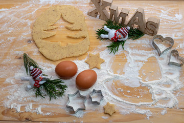 Christmas Baking background. Ingredients for cooking christmas baking on wood background