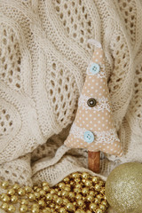 Fototapeta na wymiar textile handmade toy fir tree for Christmas. Photo