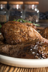 Raw marinated chicken drumsticks.