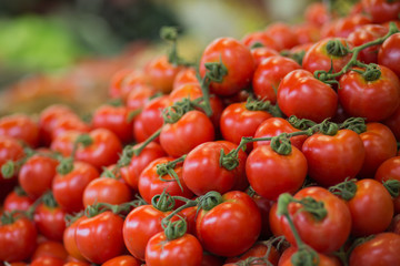 Pile of tomatoes background.