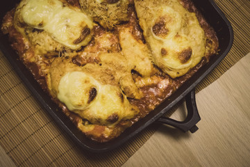 Baked chicken Breasts with vegetables and cheese