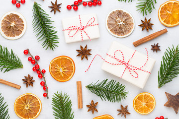 Christmas greeting card. Christmas tree branch on glitter golden bokeh lights background. New Year concept. Copy space.