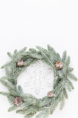 Fototapeta na wymiar Christmas wreath. Christmas decorations on white background. Flat lay, top view