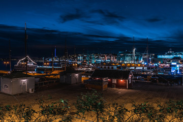 Port of Oslo city in Norway. Aker Brygge in twilight, downtown Oslo, Norway. 