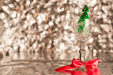 Crystal glass. Transparent crystal glass. Empty glass.  Blurred lights or bokeh lights