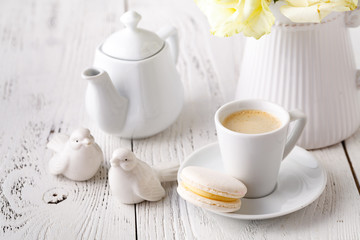Concept of female morning table  with cup of coffee on table close up