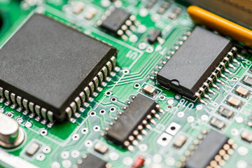 Computer motherboard. Chip close up on a integrated circuit. Electronic circuit board close up. Tech science background. Motherboard digital chip