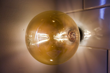 Vintage light bulb and the filaments close-up.