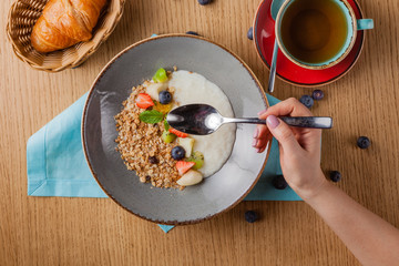 Milk rice porridge for kids healthy breakfast in cafe