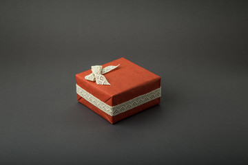 Gift box on a dark background. Top view with place for text.