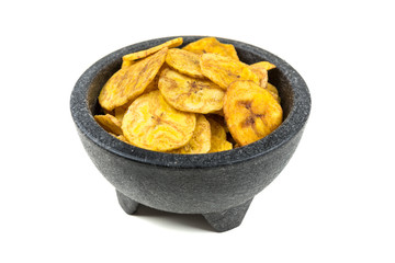 Pile of crunchy sliced dehydrated plaintain fruit chips © ecummings00