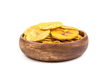 Pile of crunchy sliced dehydrated plaintain fruit chips