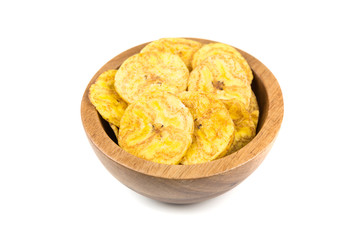Pile of crunchy sliced dehydrated plaintain fruit chips