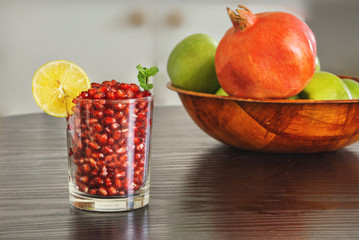 Glass of pomegranate seeds