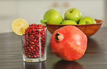 Glass of pomegranate seeds