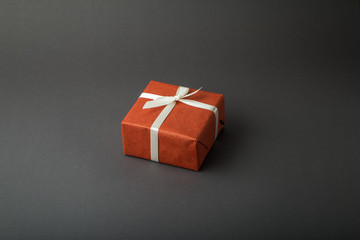 Gift box on a dark background. Top view with place for text.