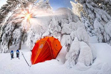 winter landscape with a tent after a storm