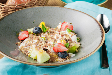 continental breakfast in a cafe, oatmeal with berries