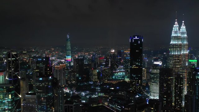 night illumination kuala lumpur cityscape downtown aerial panorama 4k malaysia

