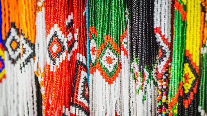 traditional handicraft made from colorful beads sold at souvenir market in Samarinda, Indonesia