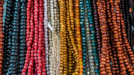 traditional handicraft made from colorful beads sold at souvenir market in Samarinda, Indonesia
