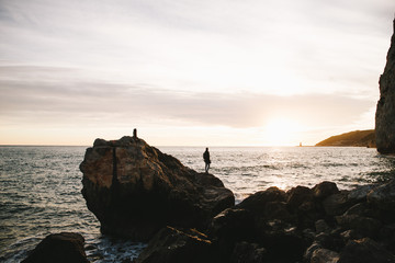 Man silhouette in a sunset Beach