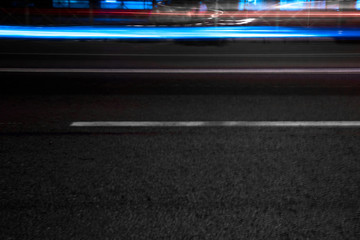 Fototapeta premium Night road with blue lights from cars