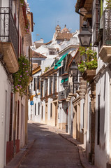 narrow street in old town córdoba, spain